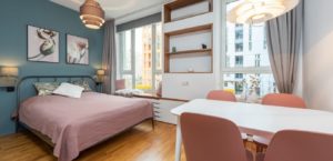 Cozy bedroom with light, pastel color scheme