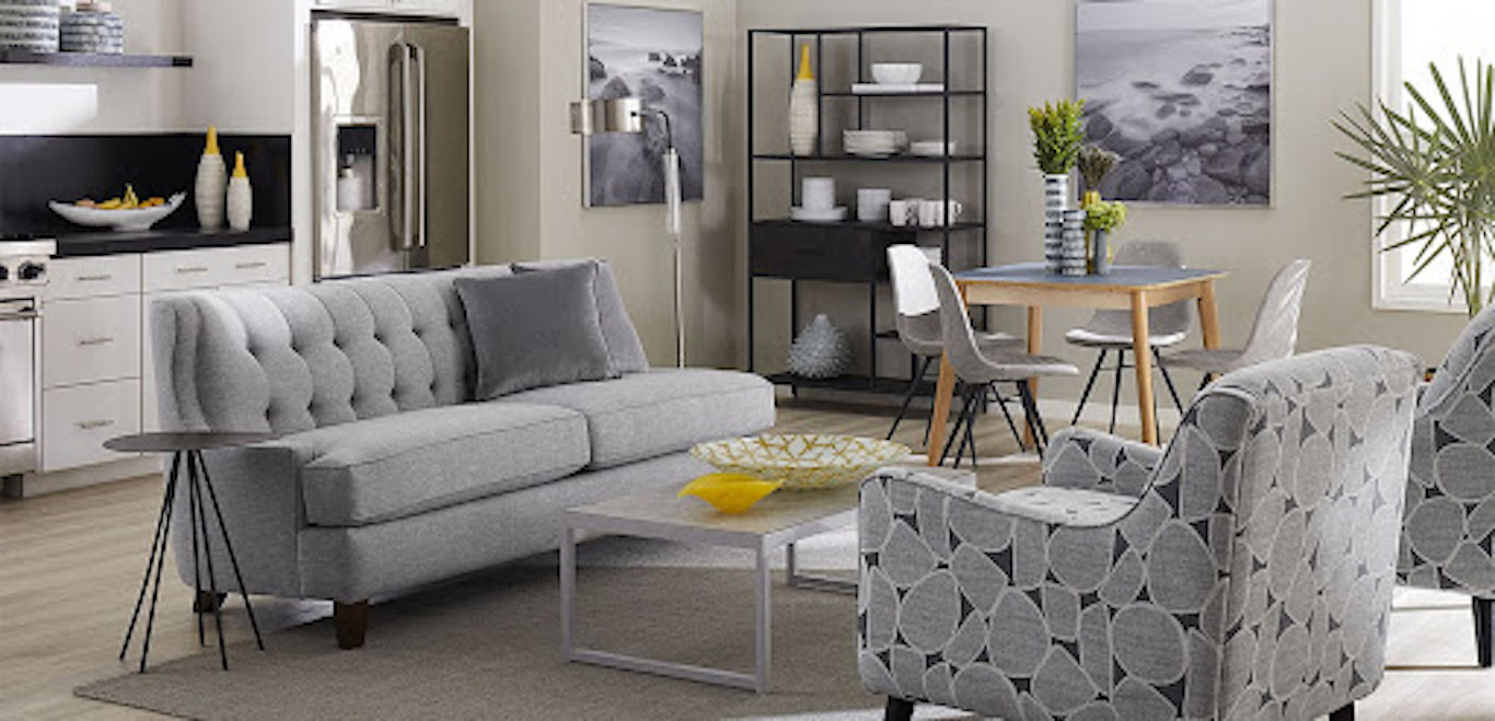 Modern grey living area with bright yellow and green accents.