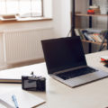 Freelancer desktop with necessary work tools. Startup retoucher and photographer office. Modern technologies, remote working, home employment concept