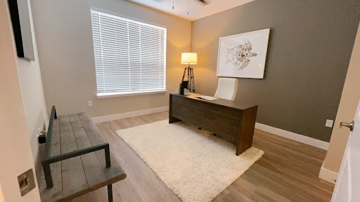 A stylish, well-lit home office setup.