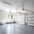 An empty garage with plenty of potential for other uses.