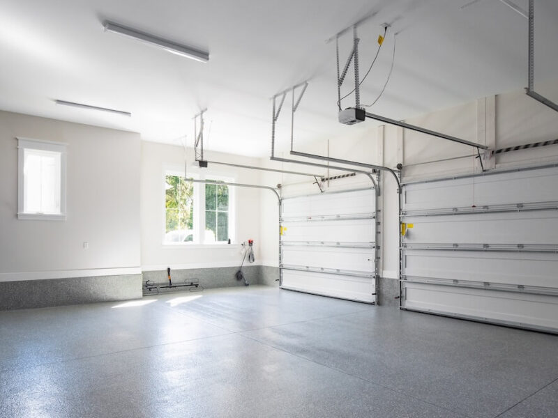 An empty garage with plenty of potential for other uses.